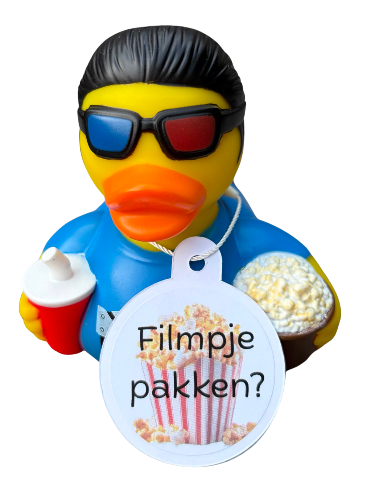 Gele bioscoopbadeend met 3D-bril, blauw shirt, popcorn, drinkbeker en een hangtag met de tekst ‘Filmpje pakken?’.