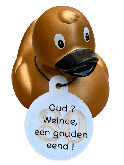 Goudkleurige badeend met zwarte snavel en een hangtag met het getal 80 en de tekst ‘Oud? Welnee, een gouden eend!’.