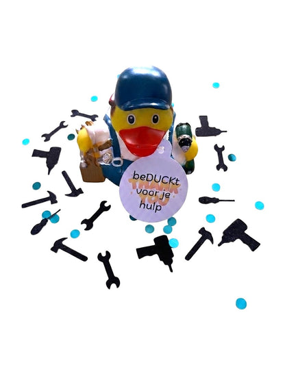 Gele klusserbadeend met hangtag ‘beDUCKt voor je hulp’, omringd door zwarte gereedschapsvormige confetti en turquoise rondjes.